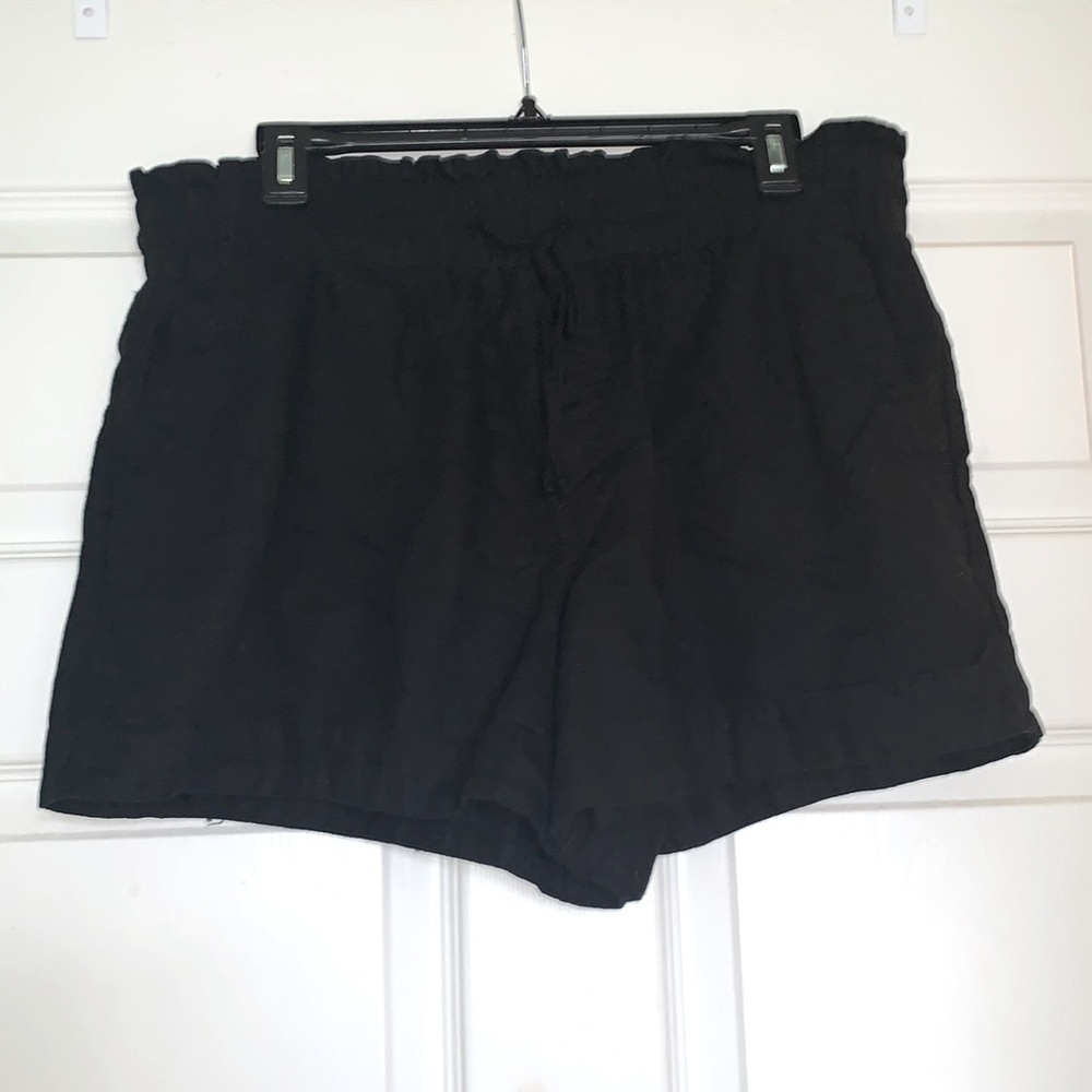 A New Day, black shorts. String tie in front. Flowy and light weight. Never worn
